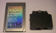   -/  IBM Home and Away PCMCIA Modem & Ethernet Adapter, p/n: 13H7334. -$9.95.